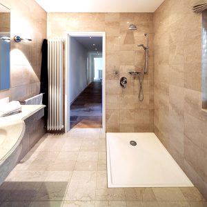 A small bathroom can be remodeled to add functionality and aesthetics by using simple renovation tricks.