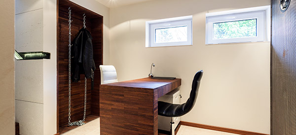 You can create your private workspace with a home office in your basement.