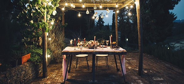 An outdoor dining table allows you to eat alfresco in your own patio and enjoy the outdoors.