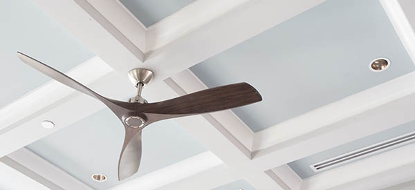 Add sophistication to your living room with a coffered ceiling