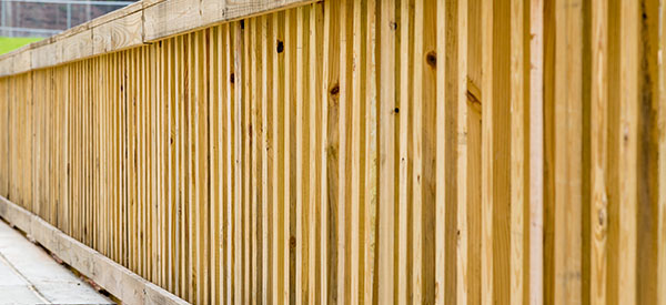 A pressure-treated fence is durable and suitable to Alberta’s climate