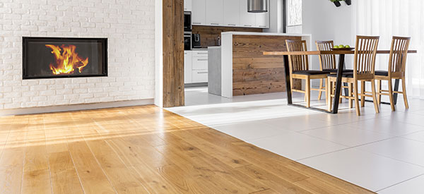 Learn the pros and cons of tile and hardwood to choose the material that is most suitable for your renovation project.