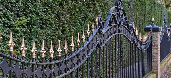 Wrought-iron or ornamental fences are classical in style and visually appealing.