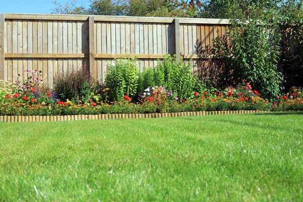 Inexpensive and attractive wooden fence.