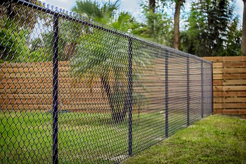 Black chain link fence for added security.