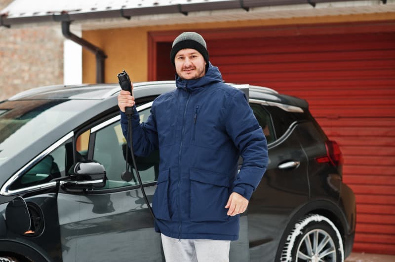 Charging an electric vehicle in cold weather.