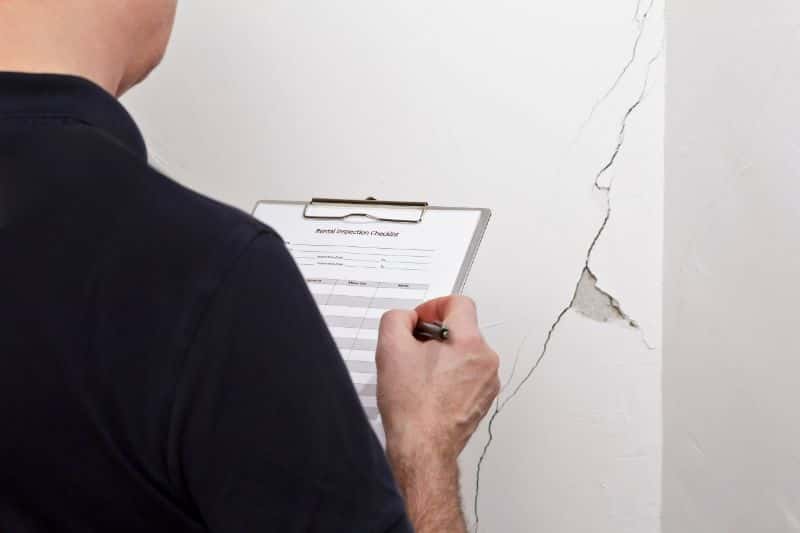 Professional repair of damaged plaster wall