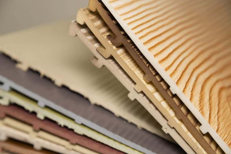 Cut vinyl siding panels in assorted colors