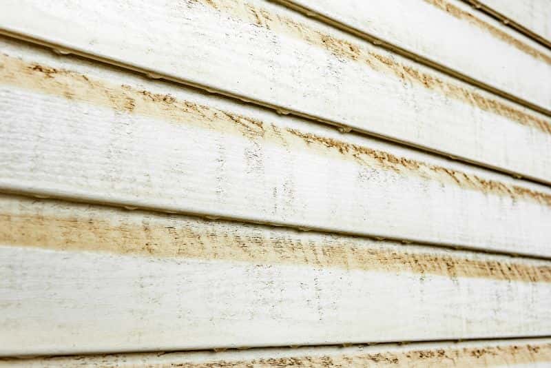Signs of damaged or old siding for replacement