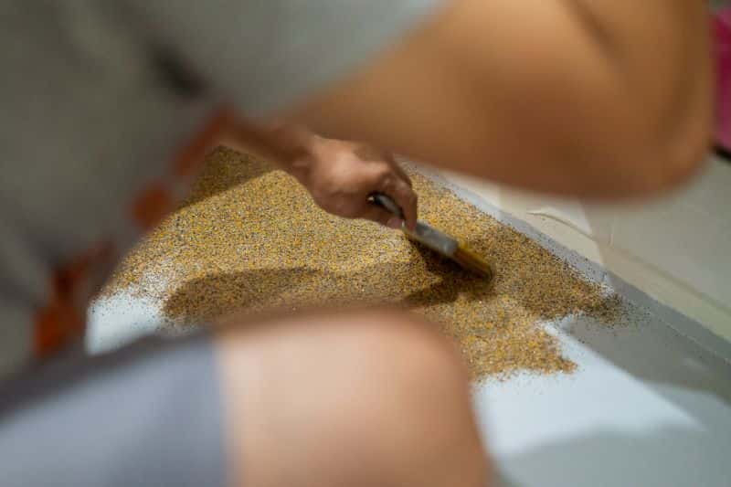 Colorful flakes mixed with resin to create beautiful flooring